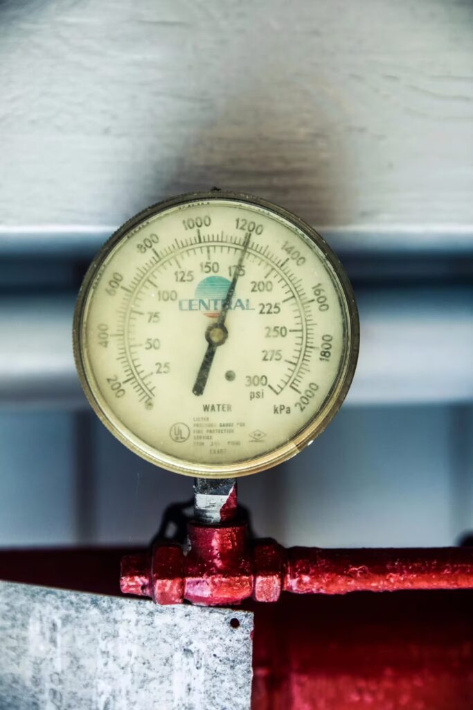Pressure on a water gauge, the needle is pointing to 1200 psi.